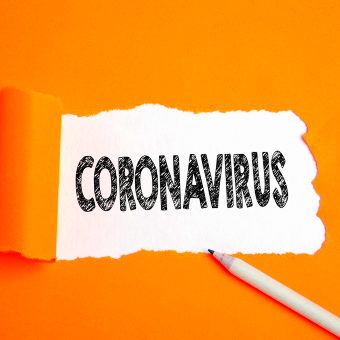 Coronavirus text sketched with pencil. 