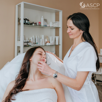 esthetician with her client