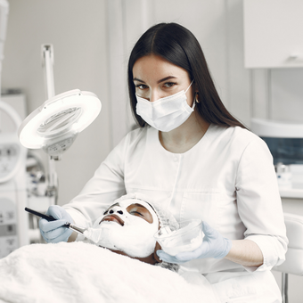 esthetician wearing a face mask