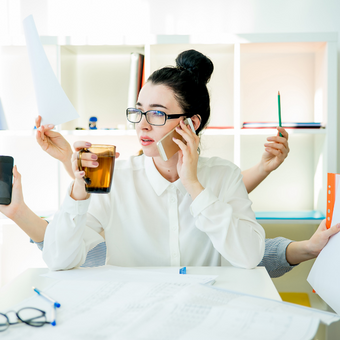 successful business woman multitasking