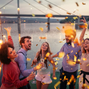 people celebrating with sparklers